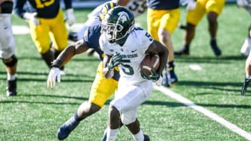Michigan State's Jayden Reed runs the ball against Michigan during the fourth quarter on Saturday, Oct. 31, 2020, at Michigan Stadium in Ann Arbor.201031 Msu Um 191a