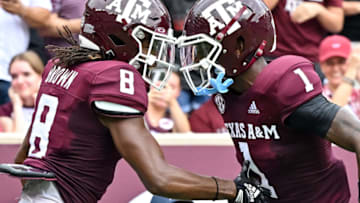 ep 3, 2022; College Station, Texas, USA; Texas A&M Aggies wide receiver Yulkeith Brown (8) celebrates a touchdown with wide receiver Evan Stewart (1) during the first quarter against the Sam Houston State Bearkats at Kyle Field. Mandatory Credit: Maria Lysaker-USA TODAY Sports