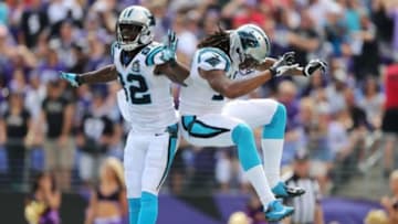 Sep 28, 2014; Baltimore, MD, USA; Carolina Panthers wide receiver Kelvin Benjamin (13) celebrates with wide receiver Jerricho Cotchery (L) after scoring a touchdown against the Baltimore Ravens at M&T Bank Stadium. Mandatory Credit: Mitch Stringer-USA TODAY Sports