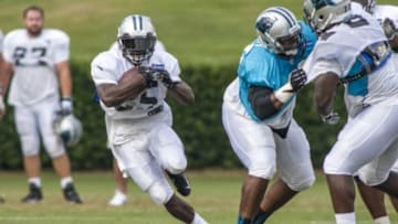 Jul 28, 2013; Spartanburg, SC USA; Carolina Panthers running back Kenjon Barner (25) runs the ball during training camp held at Wofford College. Mandatory Credit: Jeremy Brevard-USA TODAY Sports
