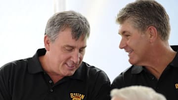 Jul 29, 2015; Foxboro, MA, USA; Boston Bruins former defenseman Ray Bourque speaks with Bruins president Cam Neely during a press conference for the Winter Classic hockey game at Gillette Stadium. Mandatory Credit: Bob DeChiara-USA TODAY Sports