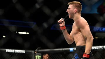 LAS VEGAS, NV - DECEMBER 30: Dan Hooker of New Zealand celebrates after his submission victory over Marc Diakiese of Congo in their lightweight bout during the UFC 219 event inside T-Mobile Arena on December 30, 2017 in Las Vegas, Nevada. (Photo by Brandon Magnus/Zuffa LLC/Zuffa LLC via Getty Images)