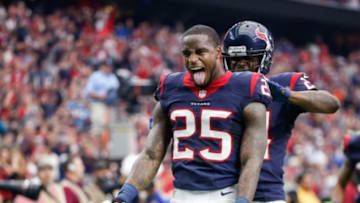 Dec 21, 2014; Houston, TX, USA; Houston Texans cornerback Kareem Jackson (25) celebrates after making an interception during the first half against the Baltimore Ravens at NRG Stadium. Mandatory Credit: Kevin Jairaj-USA TODAY Sports