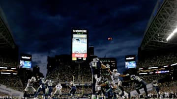 SEATTLE, WA - AUGUST 30: Michael Dickson #4 of the Seattle Seahawks punts the ball against Kyle Wilber #58 of the Oakland Raiders in the second quarter during their preseason game at CenturyLink Field on August 30, 2018 in Seattle, Washington. (Photo by Abbie Parr/Getty Images)
