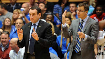 Duke basketball head coach Mike Krzyzewski and associate head coach Jon Scheyer (Photo by Lance King/Getty Images)