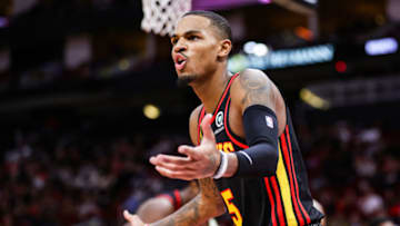 HOUSTON, TEXAS - NOVEMBER 25: Dejounte Murray #5 of the Atlanta Hawks reacts to a call during the second half against the Houston Rockets at Toyota Center on November 25, 2022 in Houston, Texas. NOTE TO USER: User expressly acknowledges and agrees that, by downloading and or using this photograph, User is consenting to the terms and conditions of the Getty Images License Agreement. (Photo by Carmen Mandato/Getty Images)