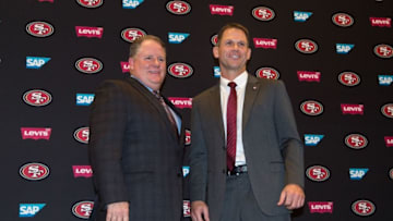 January 20, 2016; Santa Clara, CA, USA; Chip Kelly (left) and San Francisco 49ers general manager Trent Baalke (right) pose for a photo in a press conference after naming Kelly as the new head coach for the San Francisco 49ers at Levi