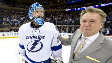 NEW YORK, NY - MAY 29: Ben Bishop #30 of the Tampa Bay Lightning is congratulated by associate coach Rick Bowness after defeating the New York Rangers in Game Seven of the Eastern Conference Final during the 2015 NHL Stanley Cup Playoffs at Madison Square Garden on May 29, 2015 in New York, New York. The Tampa Bay Lightning defeated the New York Rangers 2-0 (Photo by Scott Audette/NHLI via Getty Images)