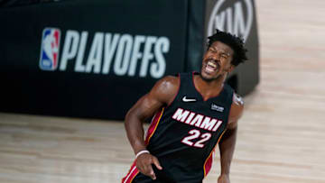 LAKE BUENA VISTA, FLORIDA - AUGUST 18: Jimmy Butler #22 of the Miami Heat reacts after dunking against the Indiana Pacers during the second half at AdventHealth Arena at ESPN Wide World Of Sports Complex on August 18, 2020 in Lake Buena Vista, Florida. NOTE TO USER: User expressly acknowledges and agrees that, by downloading and or using this photograph, User is consenting to the terms and conditions of the Getty Images License Agreement. (Photo by Ashley Landis-Pool/Getty Images)