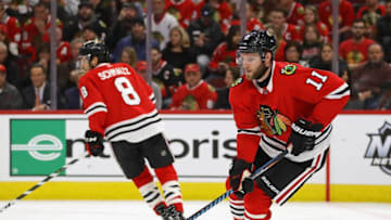 CHICAGO, IL - NOVEMBER 01: Cody Franson #11 of the Chicago Blackhawks advances the puck against the Philadelphia Flyers at the United Center on November 1, 2017 in Chicago, Illinois. (Photo by Jonathan Daniel/Getty Images)