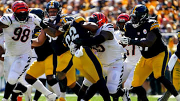Cincinnati Bengals defensive tackle Larry Ogunjobi (65) tackles Pittsburgh Steelers running back Najee Harris (22) in the backfield in the first quarter during a Week 3 NFL football game, Sunday, Sept. 26, 2021, at Heinz Field in Pittsburgh.Cincinnati Bengals At Pittsburgh Steelers Sept 26