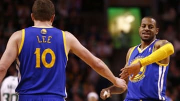 Mar 5, 2014; Boston, MA, USA; Golden State Warriors small forward Andre Iguodala (9) and power forward David Lee (10) celebrate during the second half of a game against the Boston Celtics at TD Garden. Mandatory Credit: Mark L. Baer-USA TODAY Sports