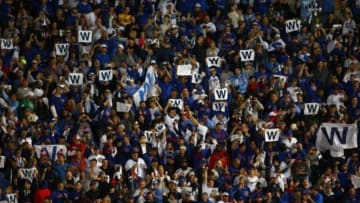 October 13, 2015; Chicago, IL, USA; Chicago Cubs fans celebrate the 6-4 victory against St. Louis Cardinals as the Cubs win the NLDS at Wrigley Field. Mandatory Credit: Jerry Lai-USA TODAY Sports