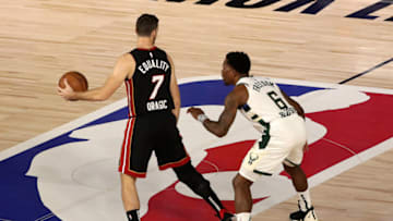 Eric Bledsoe #6 of the Milwaukee Bucks defends against Goran Dragic #7 of the Miami Heat (Photo by Mike Ehrmann/Getty Images)