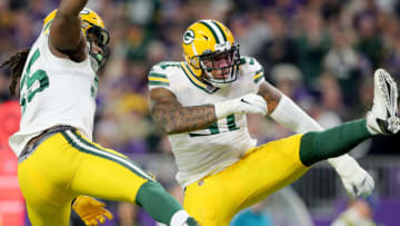 MINNEAPOLIS, MINNESOTA - DECEMBER 23: Linebacker Kyler Fackrell #51 of the Green Bay Packers and outside linebacker Za'Darius Smith #55 celebrates a sack against the Minnesota Vikings during the game at U.S. Bank Stadium on December 23, 2019 in Minneapolis, Minnesota. (Photo by Adam Bettcher/Getty Images)