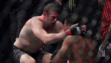 Sep 14, 2019; Vancouver, BC, Canada; Chas Skelly (red gloves) fights Jordan Griffin (blue gloves) during UFC Fight Night at Rogers Arena. Mandatory Credit: Kyle Terada-USA TODAY Sports