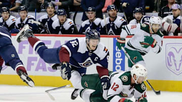 Nov 5, 2016; Denver, CO, USA; Colorado Avalanche left wing Gabriel Landeskog (92) and Minnesota Wild center Eric Staal (12) get caught up with each other in the first period at the Pepsi Center. Mandatory Credit: Isaiah J. Downing-USA TODAY Sports