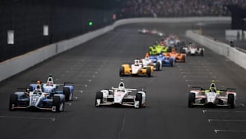 INDIANAPOLIS, IN - MAY 28: Max Chilton of England, driver of the #8 Gallagher Honda, Helio Castroneves of Brazil, driver of the #3 Shell Fuel Rewards Team Penske Chevrolet, and Ed Jones of the United Arab Emirates, driver of the #19 Boy Scouts of America Honda, lead a pack of cars during the 101st Indianapolis 500 at Indianapolis Motorspeedway on May 28, 2017 in Indianapolis, Indiana. (Photo by Jared C. Tilton/Getty Images)