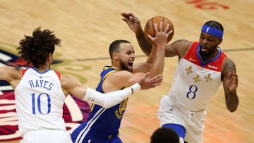 Warriors guard Stephen Curry (30) drives on New Orleans Pelicans forwards Naji Marshall (8) and center Jaxson Hayes (10) Credit: Chuck Cook-USA TODAY Sports