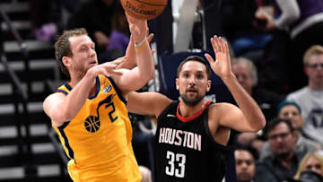 SALT LAKE CITY, UT - DECEMBER 7: Joe Ingles #2 of the Utah Jazz passes past the defense of Ryan Anderson #33 of the Houston Rockets in the first half at Vivint Smart Home Arena on December 7, 2017 in Salt Lake City, Utah. (Photo by Gene Sweeney Jr./Getty Images)