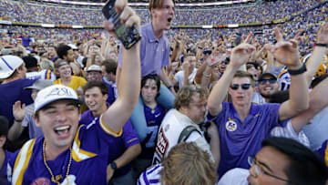 BATON ROUGE, LA - OCTOBER 13: LSU Tigers students celebrate on the field after a game against the Georgia Bulldogs at Tiger Stadium on October 13, 2018 in Baton Rouge, Louisiana. LSU Tigers won 36-16. (Photo by Jonathan Bachman/Getty Images)
