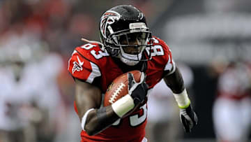 Oct 20, 2013; Atlanta, GA, USA; Atlanta Falcons wide receiver Harry Douglas (83) runs with the ball after a catch against the Tampa Bay Buccaneers during the first half at the Georgia Dome. The Falcons defeated the Buccaneers 31-23. Mandatory Credit: Dale Zanine-USA TODAY Sports