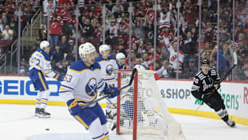 Apr 11, 2023; Newark, New Jersey, USA; New Jersey Devils center Jack Hughes (86) celebrates his empty net goal against the Buffalo Sabres during the third period at Prudential Center. Mandatory Credit: Vincent Carchietta-USA TODAY Sports