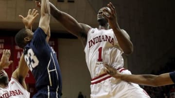 Feb 12, 2014; Bloomington, IN, USA; Penn State Nittany Lions guard Tim Frazier (23) and Indiana Hoosiers forward Noah Vonleh (1) battle for a rebound during the first half at Assembly Hall. Mandatory Credit: Pat Lovell-USA TODAY Sports