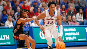 Kansas freshman guard Elmarko Jackson (13) dribbles during the second half of Monday's game against North Carolina Central inside Allen Fieldhouse.