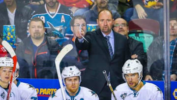Mar 7, 2016; Calgary, Alberta, CAN; San Jose Sharks head coach Peter DeBoer on his bench against the Calgary Flames during the second period at Scotiabank Saddledome. Mandatory Credit: Sergei Belski-USA TODAY Sports