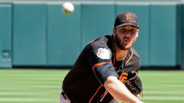 Mar 20, 2016; Salt River Pima-Maricopa, AZ, USA; San Francisco Giants starting pitcher Clayton Blackburn (52) throws during the first inning against the Colorado Rockies at Salt River Fields at Talking Stick. Mandatory Credit: Matt Kartozian-USA TODAY Sports