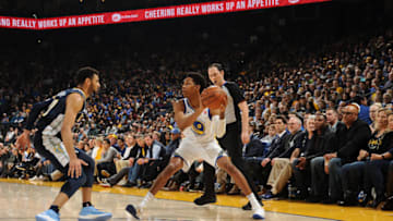 OAKLAND, CA - JANUARY 8: Patrick McCaw #0 of the Golden State Warriors handles the ball against the Denver Nuggets on January 8, 2018 at ORACLE Arena in Oakland, California. NOTE TO USER: User expressly acknowledges and agrees that, by downloading and or using this photograph, user is consenting to the terms and conditions of Getty Images License Agreement. Mandatory Copyright Notice: Copyright 2018 NBAE (Photo by Noah Graham/NBAE via Getty Images)