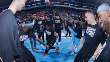 SACRAMENTO, CA - FEBRUARY 5: De'Aaron Fox #5 of the Sacramento Kings dances in the middle of a huddle prior to the game against the Chicago Bulls on February 5, 2018 at Golden 1 Center in Sacramento, California. NOTE TO USER: User expressly acknowledges and agrees that, by downloading and or using this photograph, User is consenting to the terms and conditions of the Getty Images Agreement. Mandatory Copyright Notice: Copyright 2018 NBAE (Photo by Rocky Widner/NBAE via Getty Images)