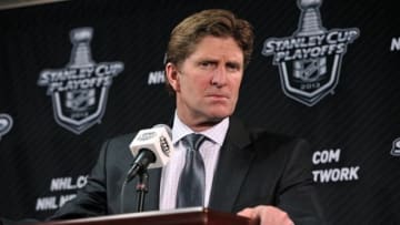 May 25, 2013; Chicago, IL, USA; Detroit Red Wings head coach Mike Babcock addresses the media after the game against the Chicago Blackhawks after game five of the second round of the 2013 Stanley Cup Playoffs at the United Center. The Blackhawks beat the Red Wings 4-1. Mandatory Credit: Rob Grabowski-USA TODAY Sports
