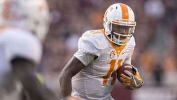 Oct 8, 2016; College Station, TX, USA; Tennessee Volunteers quarterback Joshua Dobbs (11) runs with the ball against the Texas A&M Aggies during the second half at Kyle Field. The Aggies defeat the Volunteers 45-38 in overtime. Mandatory Credit: Jerome Miron-USA TODAY Sports