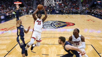 Jimmy Butler #22 of the Miami Heat shoots against Josh Hart #3 of the New Orleans Pelicans Photo by Jonathan Bachman/Getty Images)