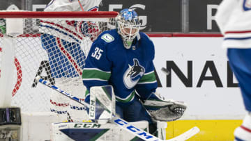 VANCOUVER, BC - MARCH 08: Goalie Thatcher Demko #35 of the Vancouver Canucks makes a save during NHL hockey action against the Montreal Canadiens at Rogers Arena on March 8, 2021 in Vancouver, Canada. (Photo by Rich Lam/Getty Images)