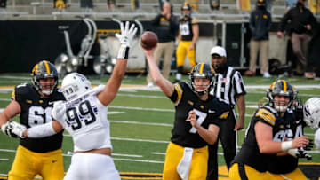 Iowa quarterback Spencer Petras fires a pass against Northwestern at Kinnick Stadium in Iowa City on Saturday, Oct. 31, 2020.20201031 Hawkeyesvsnorthwestern