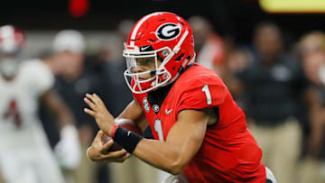 ATLANTA, GA - DECEMBER 01: Justin Fields #1 of the Georgia Bulldogs runs with the ball in the first half against the Alabama Crimson Tide during the 2018 SEC Championship Game at Mercedes-Benz Stadium on December 1, 2018 in Atlanta, Georgia. (Photo by Kevin C. Cox/Getty Images)