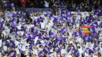 MADRID, SPAIN - APRIL 11: Real Madrid fans show their support for their side by waving flags prior to the UEFA Champions League Quarter Final Second Leg match between Real Madrid and Juventus at Estadio Santiago Bernabeu on April 11, 2018 in Madrid, Spain. (Photo by David Ramos/Getty Images)