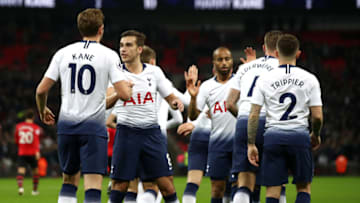 LONDON, ENGLAND - DECEMBER 05: Harry Kane of Tottenham Hotspur celebrates with team mates after scoring their first goal during the Premier League match between Tottenham Hotspur and Southampton FC at Wembley Stadium on December 5, 2018 in London, United Kingdom. (Photo by Julian Finney/Getty Images)