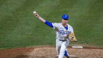 Florida's pitcher Brandon Neely (22) pitches in relief against Georgia, Friday, April 14, 2023, at Condron Family Baseball Park in Gainesville, Florida. The Gators lost Game 1 of the weekend series to the Bulldogs 13-11. [Cyndi Chambers/ Gainesville Sun] 2023Gator Baseball April 14 2023 Condron Family Ballpark Georgia Bulldogs