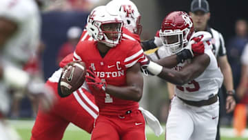 Sep 3, 2016; Houston, TX, USA; Houston Cougars quarterback Greg Ward Jr. (1) looks for an open receiver during the second quarter against the Oklahoma Sooners at NRG Stadium. Mandatory Credit: Troy Taormina-USA TODAY Sports