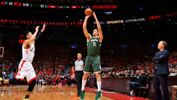 TORONTO, CANADA - MAY 19: Brook Lopez #11 of the Milwaukee Bucks shoots a three-pointer against the Toronto Raptors during Game Three of the Eastern Conference Finals of the 2019 NBA Playoffs on May 19, 2019 at the Scotiabank Arena in Toronto, Ontario, Canada. NOTE TO USER: User expressly acknowledges and agrees that, by downloading and or using this Photograph, user is consenting to the terms and conditions of the Getty Images License Agreement. Mandatory Copyright Notice: Copyright 2019 NBAE (Photo by Jesse D. Garrabrant/NBAE via Getty Images)