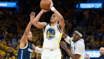 May 20, 2022; San Francisco, California, USA; Golden State Warriors guard Jordan Poole (3) shoots the basketball against Dallas Mavericks guard Jalen Brunson (13) during the fourth quarter in game two of the 2022 western conference finals at Chase Center. Mandatory Credit: Kyle Terada-USA TODAY Sports