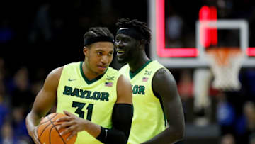 KANSAS CITY, MO - NOVEMBER 21: Terry Maston #31 and Jo Lual-Acuil Jr. #0 of the Baylor Bears celebrate as the Bears defeated the Creighton Bluejays to win the National Collegiate Basketball Hall Of Fame Classic Championship game at Sprint Center on November 21, 2017 in Kansas City, Missouri. (Photo by Jamie Squire/Getty Images)