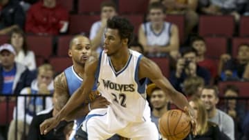 Oct 12, 2016; Lincoln, NE, USA; Minnesota Timberwolves forward Andrew Wiggins (22) drives against Denver Nuggets guard Jameer Nelson (1) in the second half at Pinnacle Bank Arena. Minnesota won 105-88. Mandatory Credit: Bruce Thorson-USA TODAY Sports
