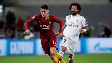 ROME, ITALY - NOVEMBER 27: (L-R) Cengiz Under of AS Roma, Marcelo of Real Madrid during the UEFA Champions League match between AS Roma v Real Madrid at the Stadio Olimpico Rome on November 27, 2018 in Rome Italy (Photo by David S. Bustamante/Soccrates/Getty Images)