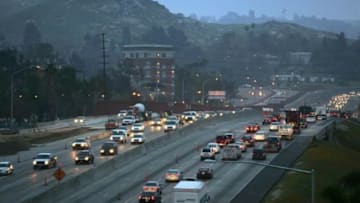 RIVERSIDE, CA - MARCH 14: Morning rush-hour traffic moves along the 60 freeway, after Environmental Protection Agency (EPA) Administrator Stephen L. Johnson this week announced a modest lowering of legal limits on ozone pollution standards, on March 14, 2008 in Riverside, California. The change angered not only industry groups who lobbied against the change but also medical, scientific and environmental groups who say that tougher limits are needed. EPA science advisors and a children's health panel had unanimously recommended tougher standards to protect the public, especially children and the elderly, from serious respiratory problems caused by breathing ground-level ozone that aggravates asthma and can lead to premature death, as shown by mounting evidence. A second proposal for more stringent seasonal limits on ozone based on its harm to forests, crops and other plants was reportedly quashed at the 11th hour by President Bush. Governments in areas where the air is declared dirty as the pollution limit of about 84 parts per billion changes to about 75 ppb over an average eight-hour period will have two decades to reduce their emissions. (Photo by David McNew/Getty Images)