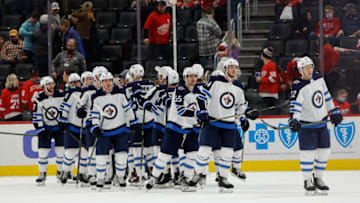 Jan 13, 2022; Detroit, Michigan, USA; Winnipeg Jets celebrate after defeating the Detroit Red Wings at Little Caesars Arena. Mandatory Credit: Rick Osentoski-USA TODAY Sports